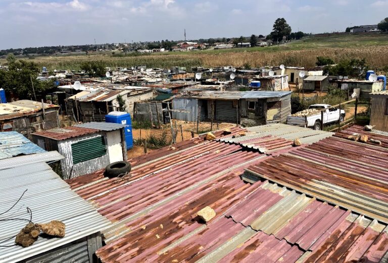 Living in the shadow of hope: the story of Ramaphosa Informal Settlements